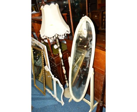 A CREAM AND GILT OVAL CHEVAL MIRROR, an onyx standard lamp (2)