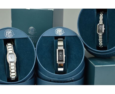 THREE BOXED LADYS CITIZEN ECO-DRIVE WRISTWATCHES, the first designed with an elongated octagonal head, black face and stainle
