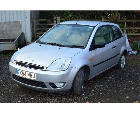 A FORD FIESTA GHIA. 1388cc petrol engine, manual gearbox, three door hatchback, silver metallic and cream leather seats, firs