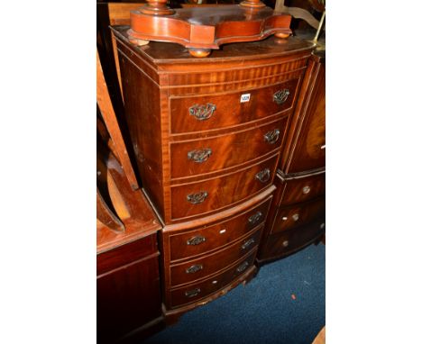 A TALL NARROW REPRODUCTION MAHOGANY BOW FRONT CHEST OF SIX GRADUATING DRAWERS on bracket feet, approximate width 55cm x depth