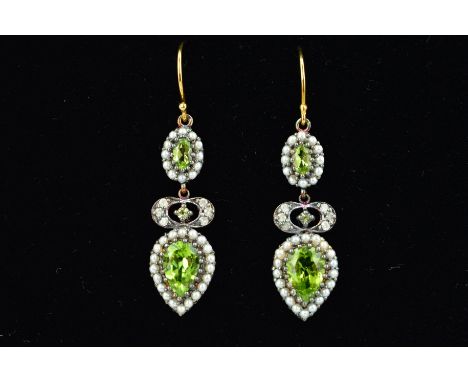 A PAIR OF PERIDOT AND SEED  PEARL EARRINGS, each designed as a pear shape peridot within a seed pearl surround suspended from