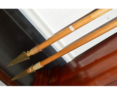 A PAIR OF LIGHT OAK SPEARS and another pair of spears (4)
