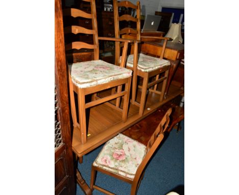 AN ERCOL ASH DINING SUITE comprising of a draw leaf table, four chairs and a dresser, approximate width 156cm x depth 52cm x 