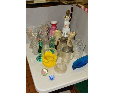 A GROUP OF DECORATIVE GLASSWARE to include a white flash cut lamp, decanters, candlesticks and vases etc