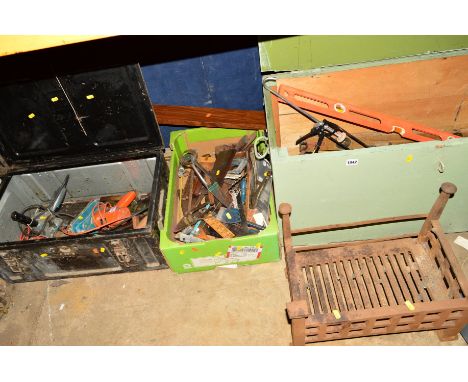 A LARGE WOODEN CHEST and box containing various vintage hand tools, together with a cast iron fire grate (3)