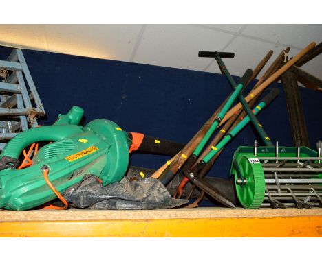 A BLACK AND DECKER LEAF BLOWER/VACUUM, push along scarifier and various garden tools (8)