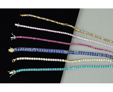 SIX GEM SET BRACELETS to include a two row, oval sapphire bracelet, a colourless cubic zirconia single row bracelet, a synthe