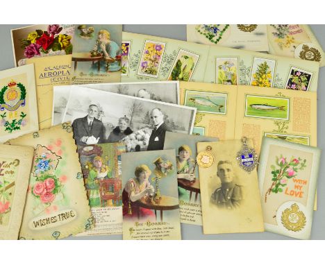 A 9CT GOLD MEDALLION, A SILVER MEDALLION, A SELECTION OF ANTIQUE POSTCARDS, CHRISTMAS CARDS, THREE CIGARETTE CARD ALBUMS AND 