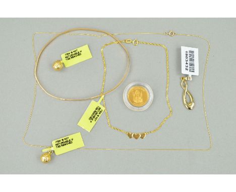TWO PENDANTS, TWO PENDANT NECKLACES, A BANGLE AND A COIN to include a triple heart children's necklace, a football pendant su
