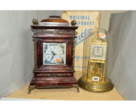 A BOXED KUNDO BLACK FORREST 400 DAY GLASS DOMED CLOCK,  in need of attention together with a quartz bracket clock (2)