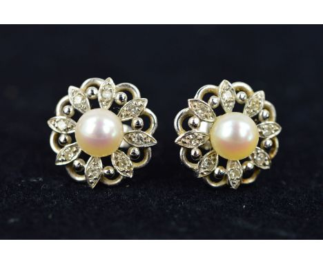 A PAIR OF MID TO LATE 20TH CENTURY CULTURED PEARL AND DIAMOND ROUND STUD EARRINGS, circular open foliate framework, measuring