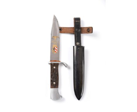 A Rare German Third Reich Hitler Youth 1935 Presentation  Knife, the 11.5cm blade etched with gold inscription 'Reichsparteit