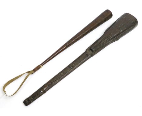 A 19th Century Rosewood Truncheon, possibly Trobriand Islands, of slender tapering cylindrical form, the upper section carved