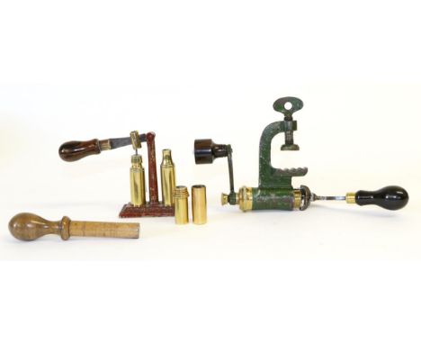 Five Vintage Shotgun Cartridge Tools, including a 12 bore capper / decapper with coromandel handle on painted cast iron base 