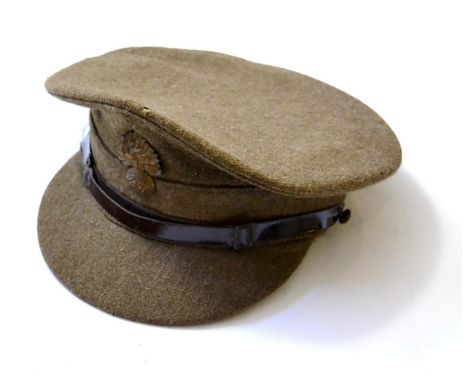 A First World War No.2 Service Cap, with original brass badge to the Royal Fusiliers, the green leather sweatband with size l