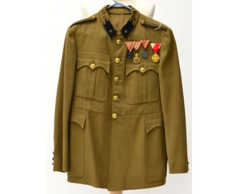 An Austro-Hungarian Officer's Khaki Tunic, with gilt bullion star embroidered black wool collar tabs, gilt cord shoulder stra