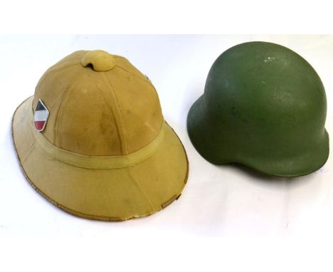 A German Third Reich Army Tropical Helmet, with six panel crown and four panel brim, applied with later army and national col