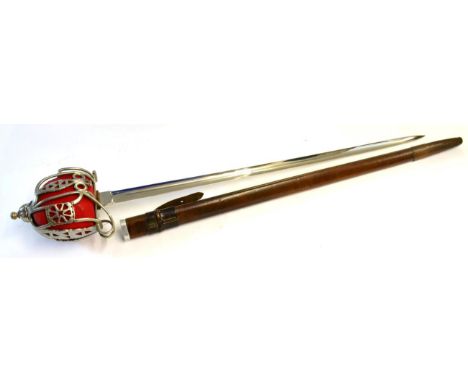 An Early 20th Century Scottish Basket Hilt Broadsword, the 81.5 cm plated blade stamped ''proved'' and indistinctly bearing m