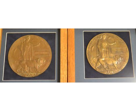 Two First World War Memorial Plaques, respectively to John Harrison and William Johnson, each framed and glazed and with acco