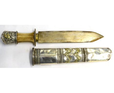 A Late 19th Century Tibetan Knife, with 17cm clip point blade, white metal hilt with shallow oval guard, waisted horn grip an