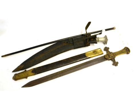 An 1895 Pattern Mk.II Drummers' Sword, double edge blade, cast brass cruciform hilt with Victoria monogram, brass mounted lea