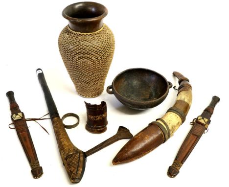 A Collection of African Artefacts, comprising an Upper Congo axe, two Sudanese knives with leather bound grips and sheaths, a