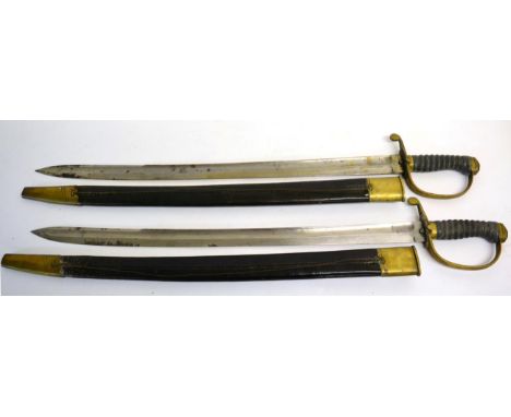 A Pair of 19th Century Constabulary Hangers, each with a slightly curved, fullered, single edge blade, double-edged for the l