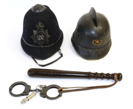 An Early 20th Century German Leather Fire Brigade Helmet, with lacquered metal comb, the brass-rimmed peak surmounted by a br