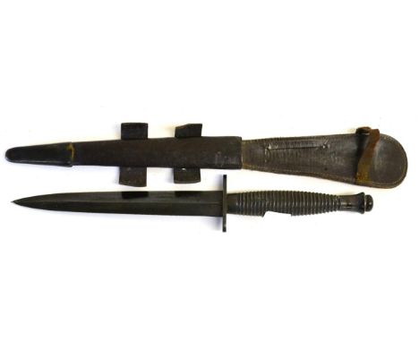 A Post War Commando Knife, 3rd Pattern, blackened finish, with hand forged double edge steel blade, unmarked crossguard, ring