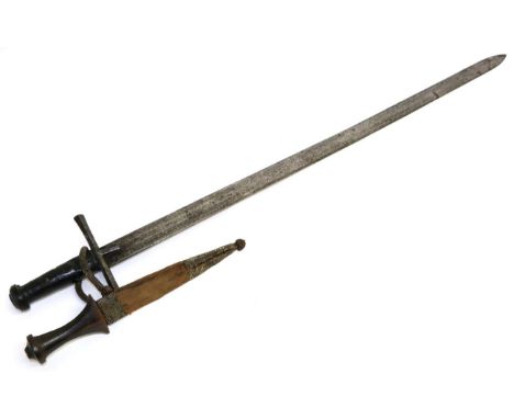 An Early 19th Century Sudanese Kaskara, the 90cm double edge steel blade with a central narrow fuller running for 23cm down o