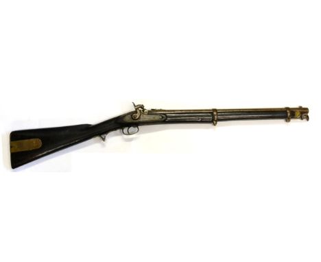 A 19th Century Indian Sepoy Percussion Carbine, the 53cm steel barrel with indistinct markings and hinged leaf rear sight, wa
