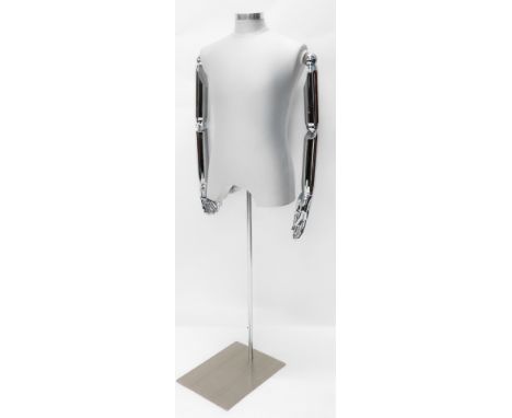 A tailor's mannequin torso, with articulated chrome arms, on rectangular plate base, 151cm high.
