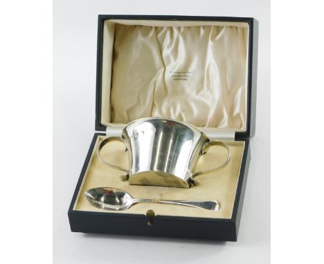 A George V silver christening set, comprising two handed bowl, by Munsey &amp; Co, Sheffield, 1928, 6cm high, Britannia mark,