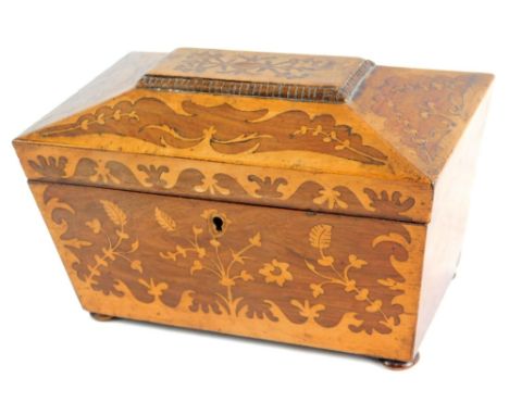 A 19thC rosewood and inlaid tea caddy, the sarcophagus lid revealing a sectional interior, the exterior profusely decorated w