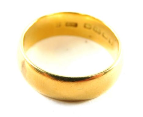 An 18ct gold thick wedding band, of plain design, ring size Y, 11.3g.