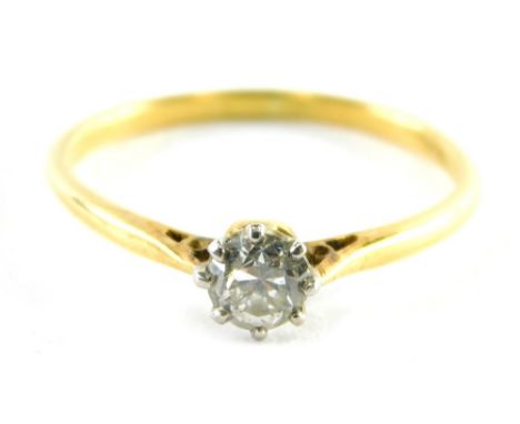 A diamond dress ring, centred with a round brilliant cut diamond, approximately O.08 carats, in claw setting, yellow metal st