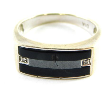 A 9ct white gold gentleman's signet ring, with rectangular bar set with black agate and tiny diamonds, ring size U½, 5.5g all