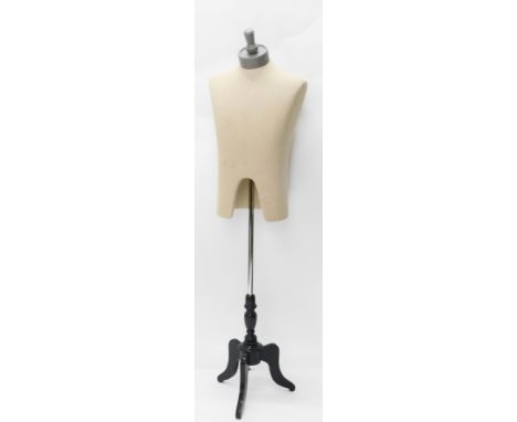 A tailor's mannequin torso, with cylindrical mount for head, on cylindrical stem and triple cabriole legs, 144cm high.