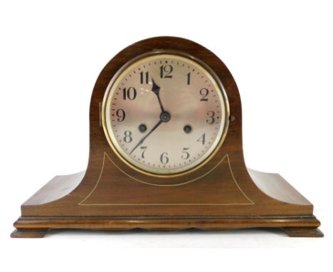 A mid 20thC Napoleon hat mantel clock, with 14cm diameter Roman numeric dial, on compressed bracket feet, with an eight day m