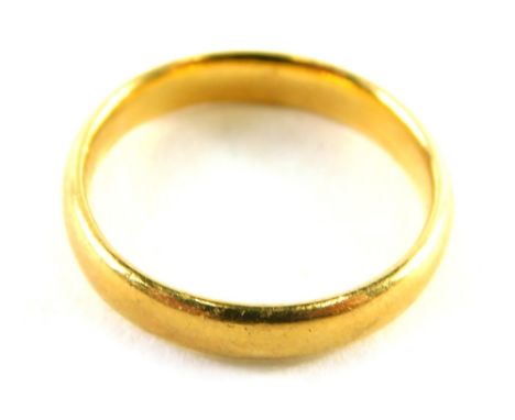 A 22ct gold wedding band, of plain design, ring size J½, 3.6g.