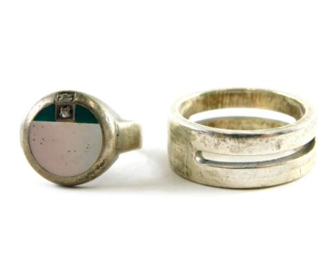 Two silver dress ring, comprising a gentleman's silver signet ring, with tiny diamond, ring size X, and a mother of pearl and