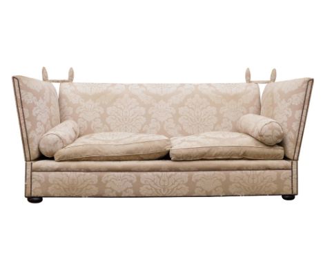 A large beige and cream damask Knoll sofa, by London maker George Smith, with studded borders, on bun feet, 239cm wide the fr