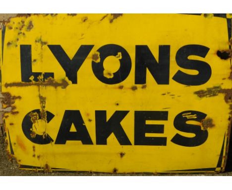 A 20thC Lyons Cakes enamel sign, in black lettering on yellow ground, 74cm x 96cm