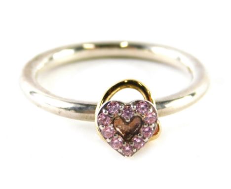 A Pandora dress ring, with central heart and gold loop, set with pink topaz, stamped 925 ale, ring size S, boxed, 4.4g.