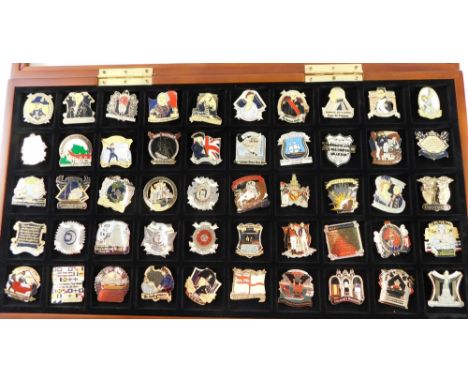A Life of Nelson reproduction enamel finish pin badge set, to include Battle of Grand Turk, 4cm high, in fitted case with som