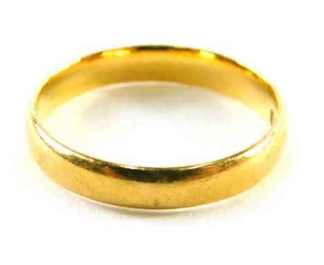 A 22ct gold wedding band of plain design, ring size L, 2.9g.