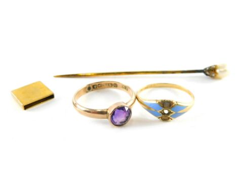 Three items of jewellery, comprising a 9ct gold and amethyst dress ring, ring size I, a yellow metal and enamel gypsy ring, u