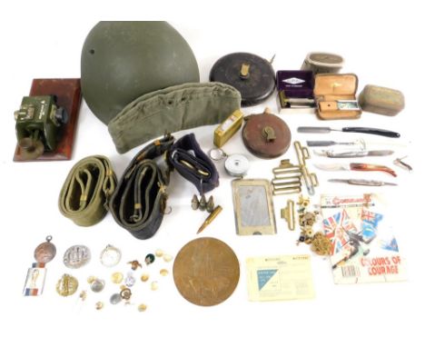 Various army related items, WWII etc, a helmet numbered 8974, other apparatus, part Sam Browne style belts, Commando War Stor