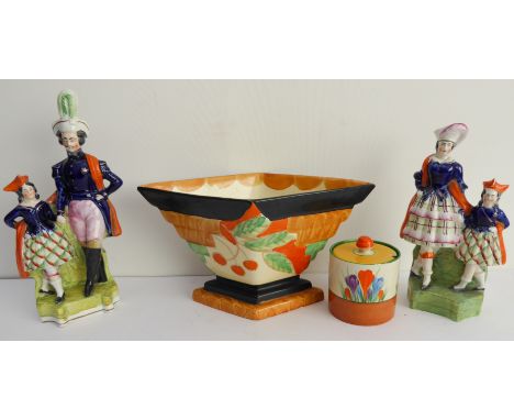 Four pieces of ceramics:a Clarice Cliff preserve pot and cover, hand-decorated in the Autumn Crocus pattern;a Myott, Son & Co