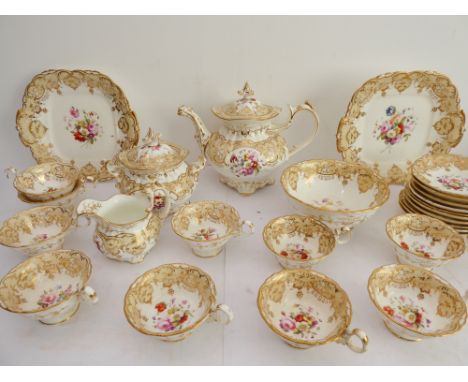 A 19th century ceramic tea service hand-gilded and decorated in enamels with various floral sprays comprising:a teapot and co